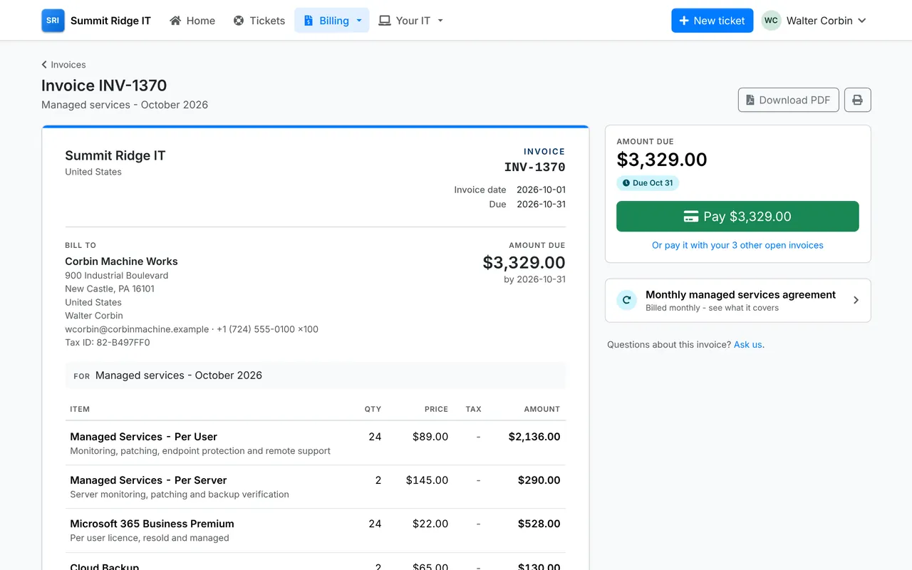 An invoice in the client portal with a button to pay it by card